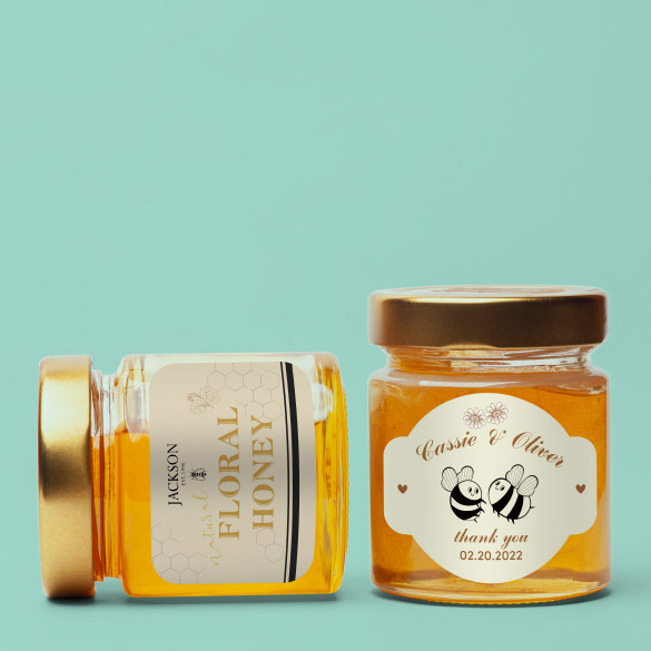 small quantity printing services also include polygonal stickers that can be applied to two bottles of honey products. 